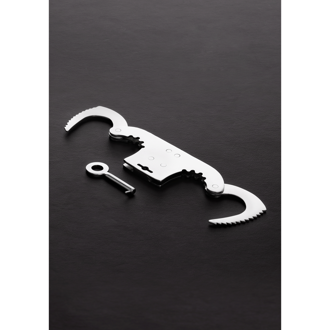 BDSM kellék Thumb Cuff – ezüst