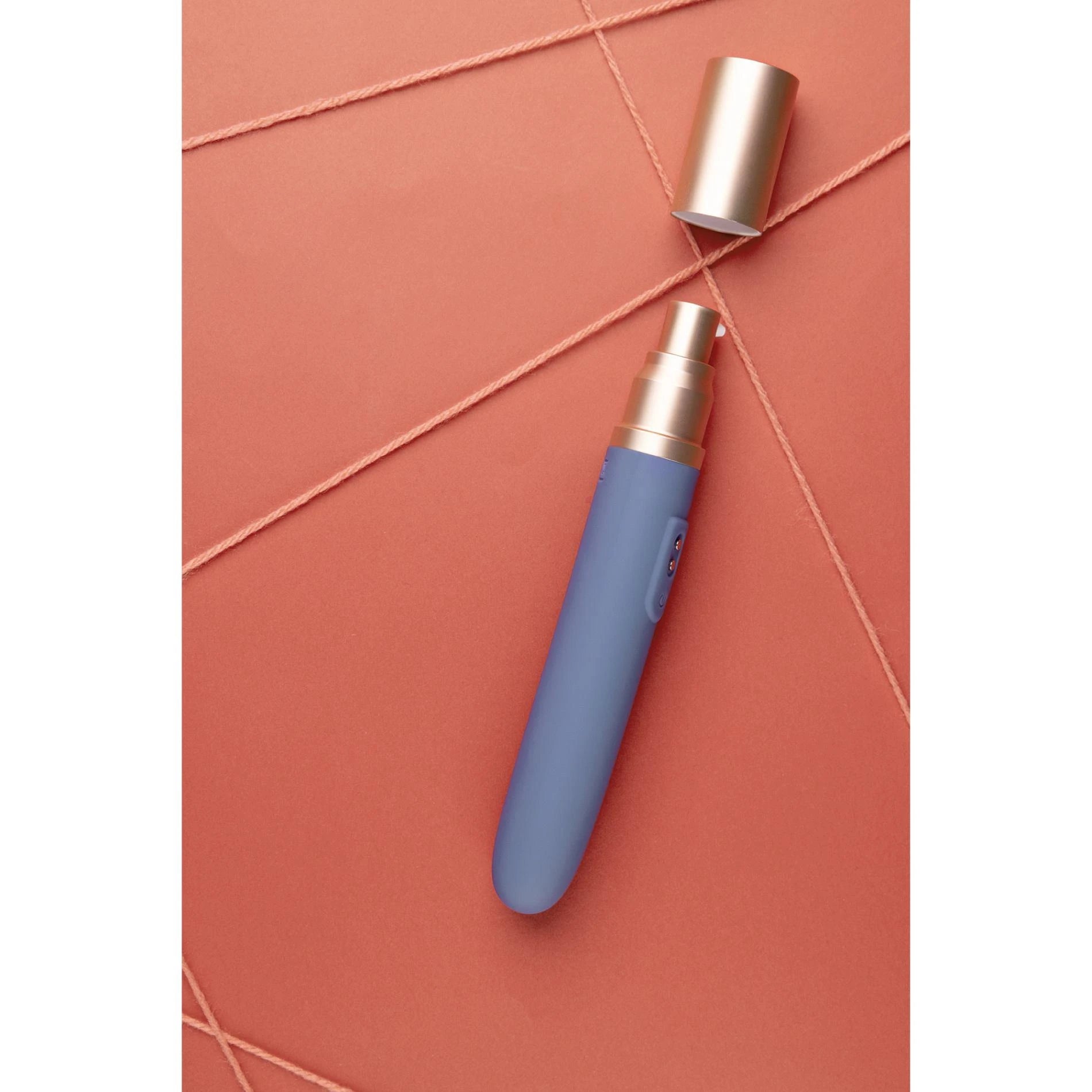 Vibromasseur de voyage avec compartiment lubrifiant et pompe