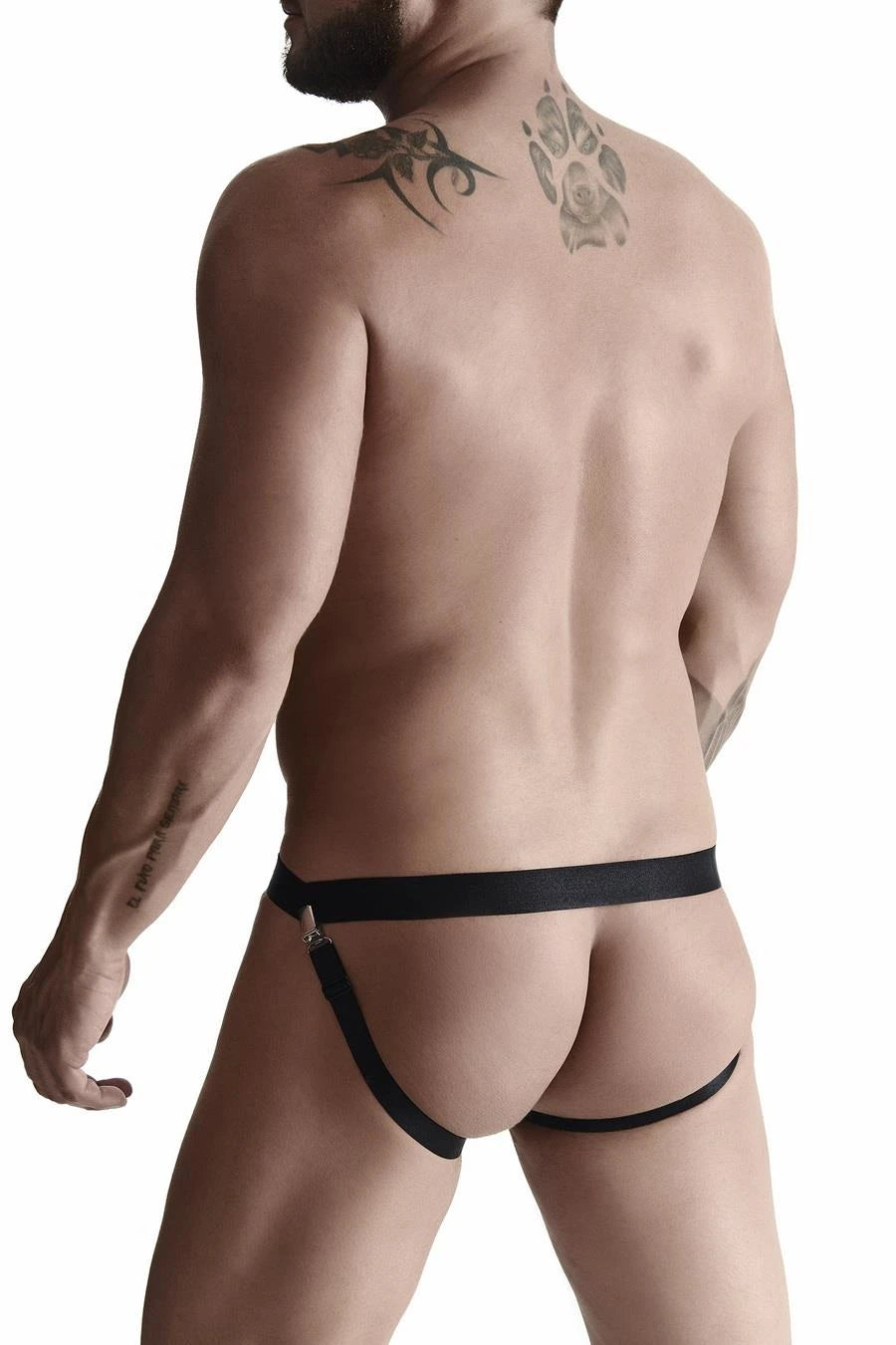 slip pour homme en caoutchouc avec arrière ouvert, élément décoratif sur le devant et attaches S/M