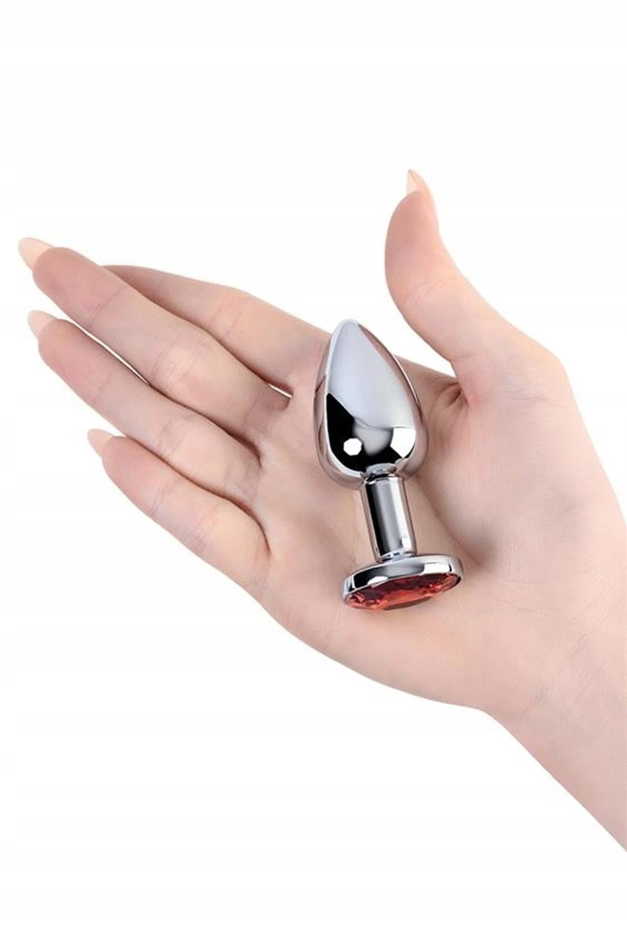 Silver anal plug with  red gem