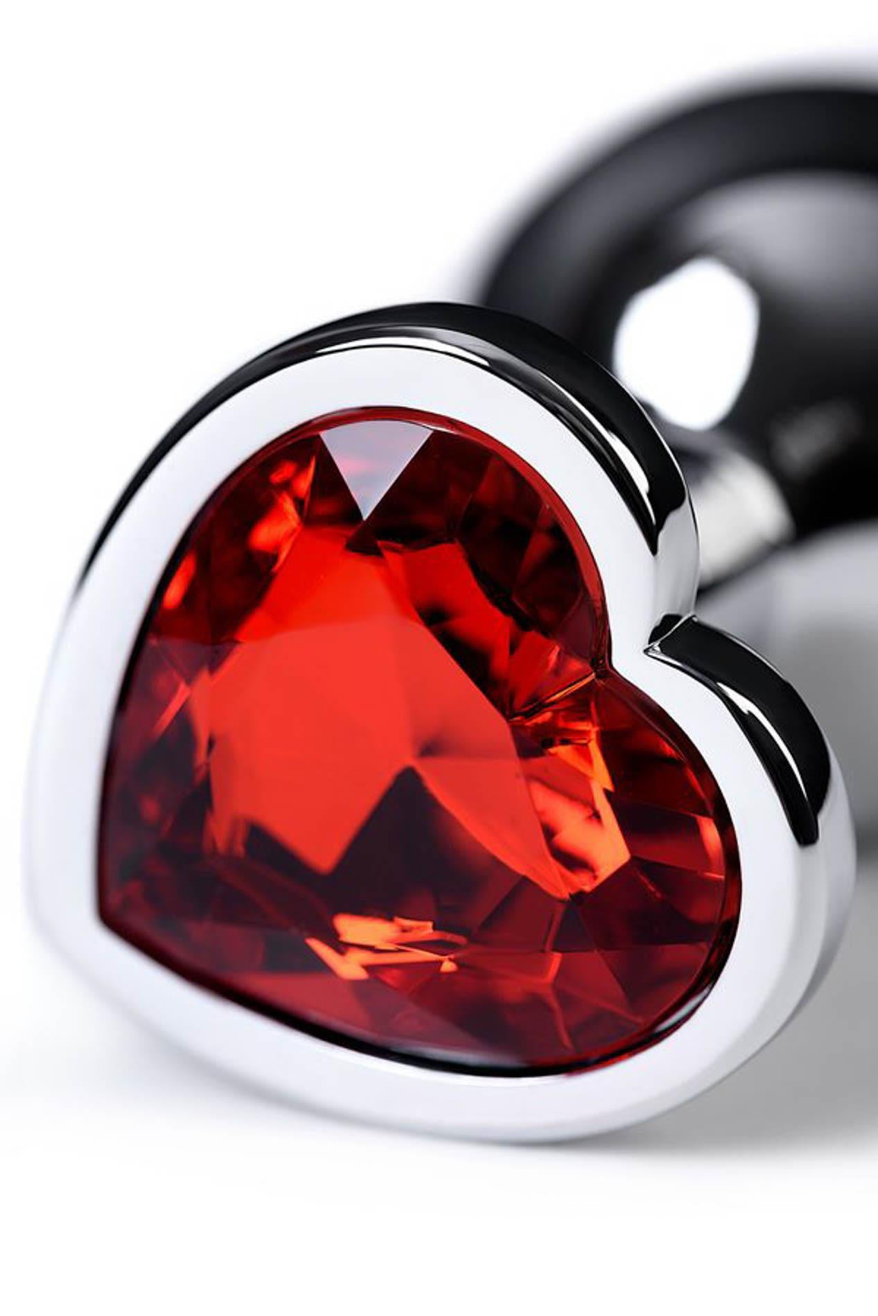 Plug anal en argent avec cœur rose en forme de gemme