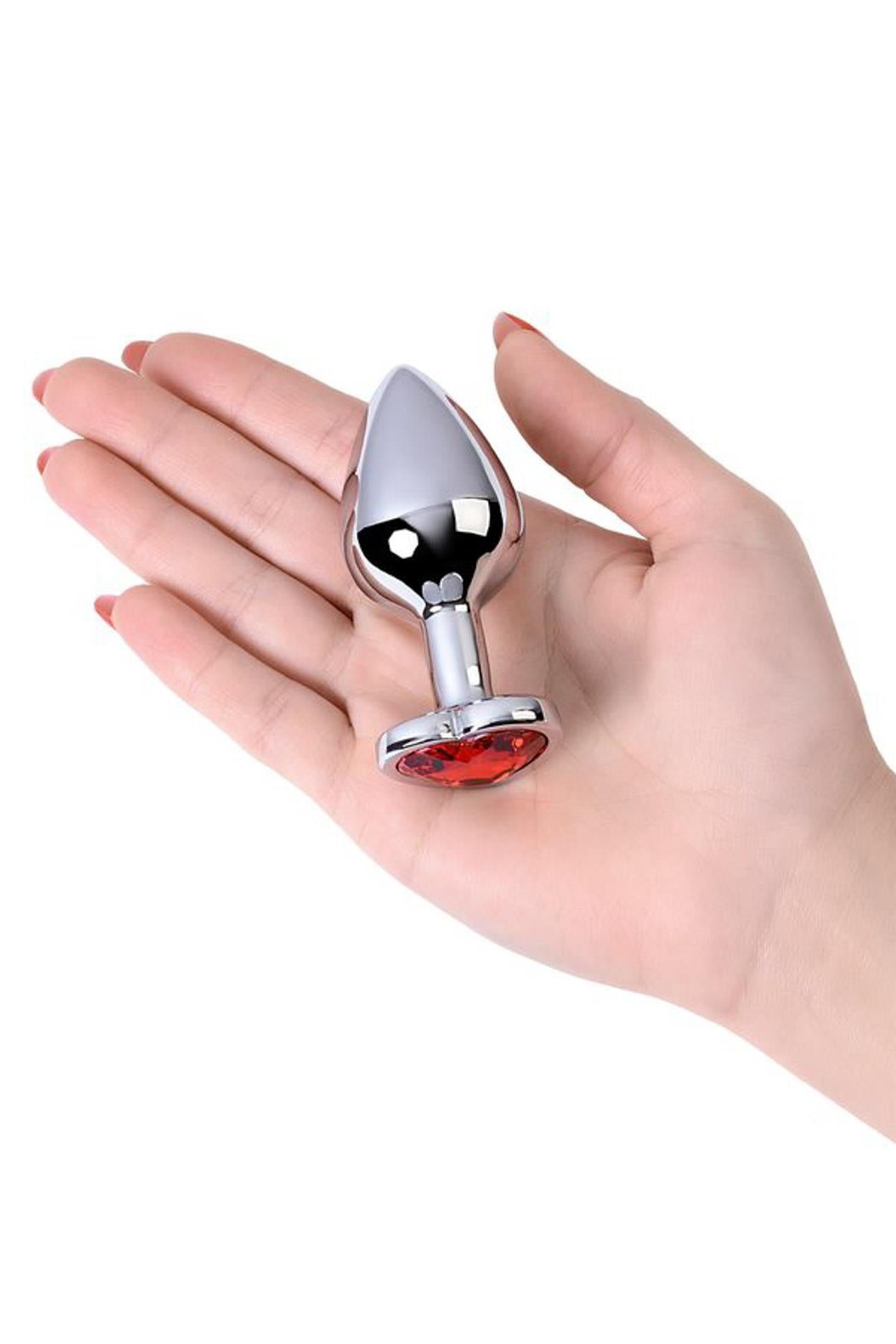 Plug anal en argent avec cœur rose en forme de gemme