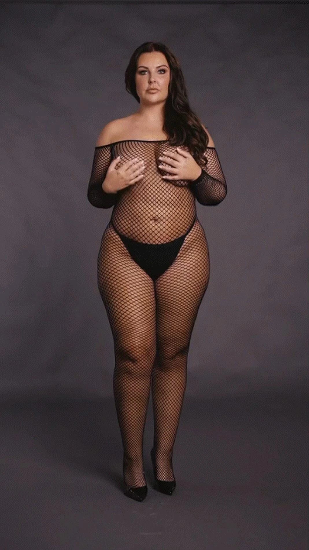 Bodystocking with off-shoulder neckline, fishnet structure, and open crotch.