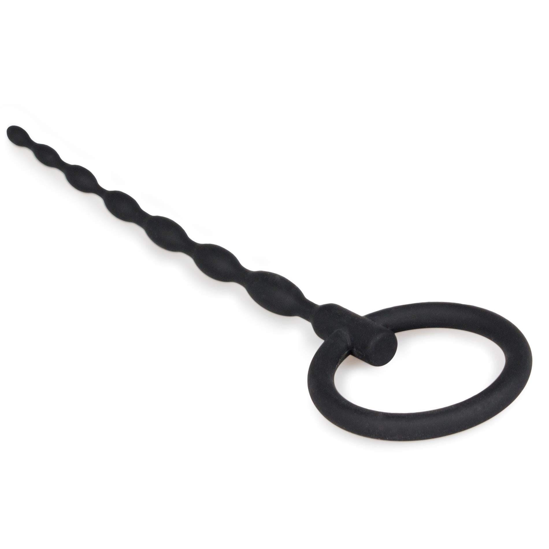 Obturateur pénien en silicone avec anneau de traction