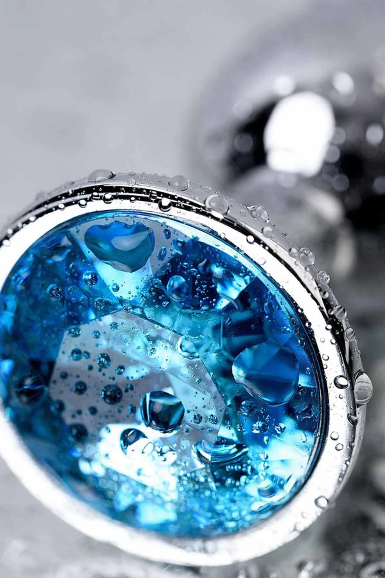 TOYFA Metal silver anal plug, with a Topaz colored gem
