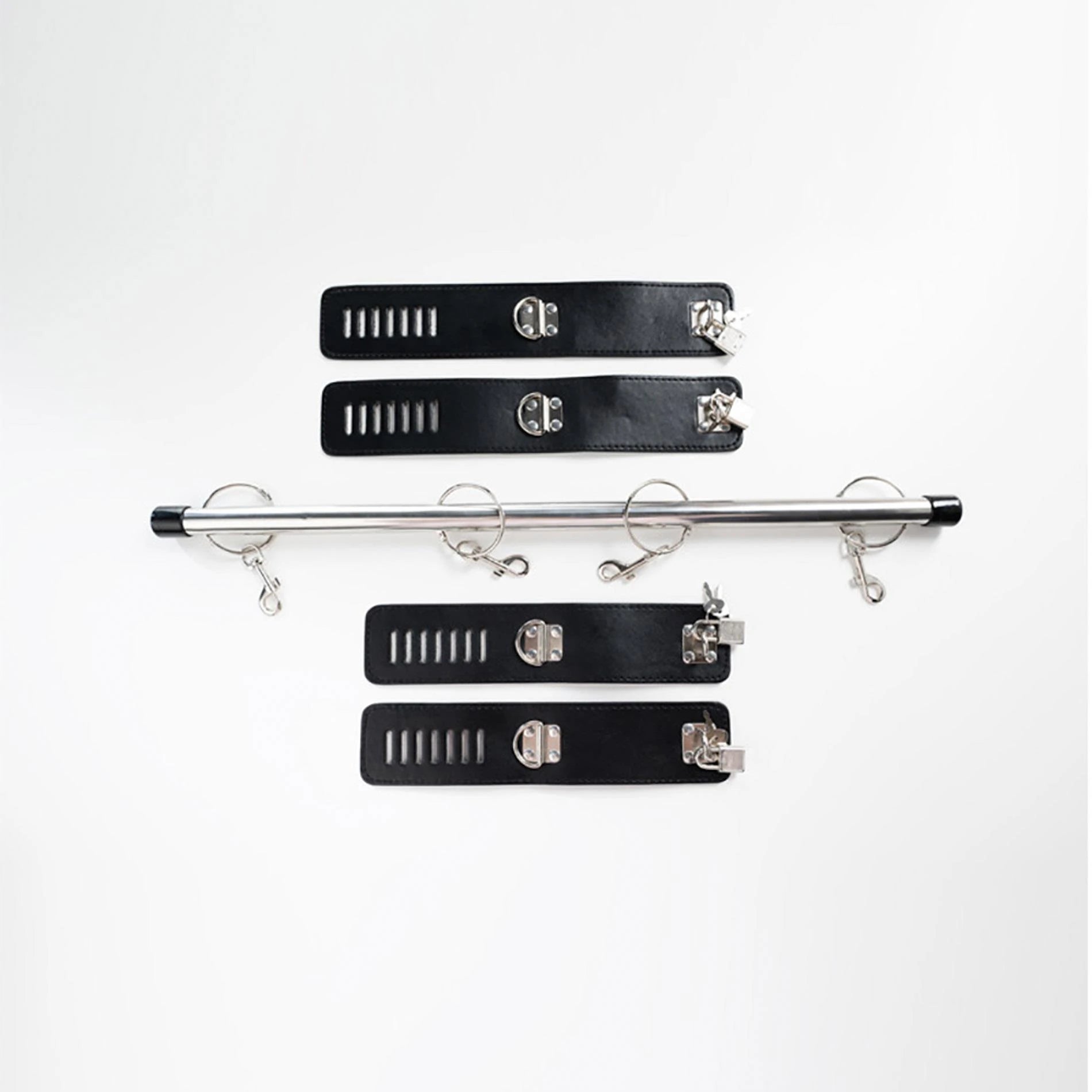 Spreader bar with wrist and ankle cuffs