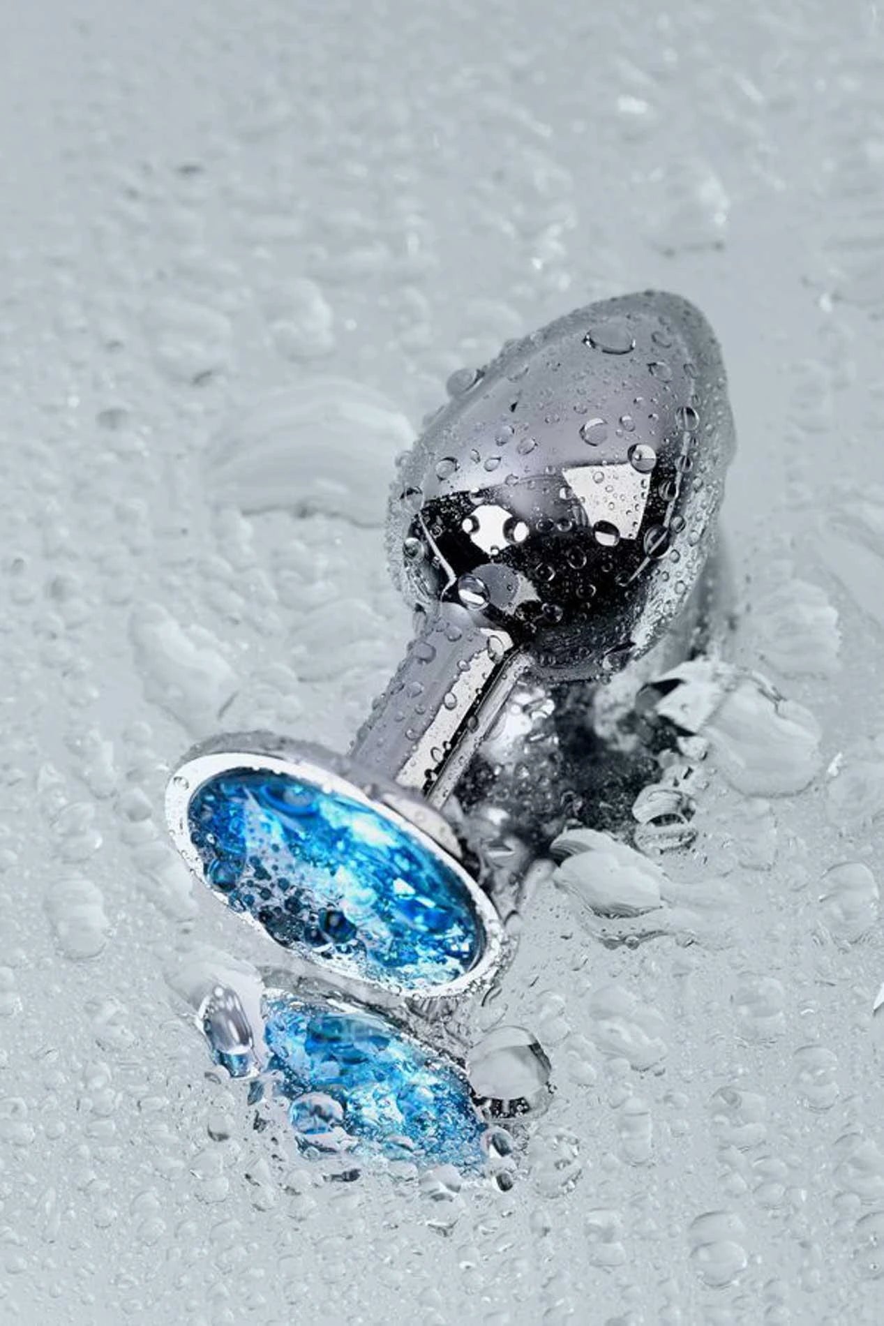 TOYFA Metal silver anal plug, with a Topaz colored gem