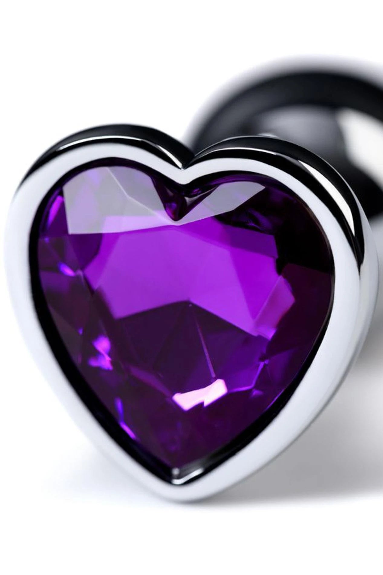 Silver anal plug with purple heart-shaped gem